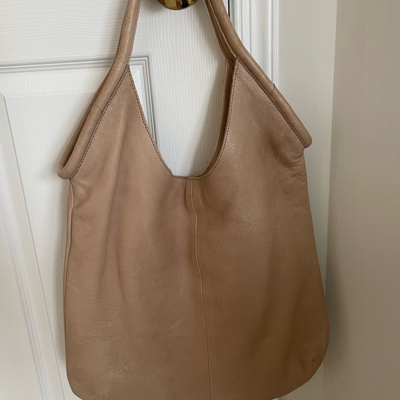 Anthropologie shoulder bag. Distressed vegan leather in a light taupe color. - Picture 2 of 4